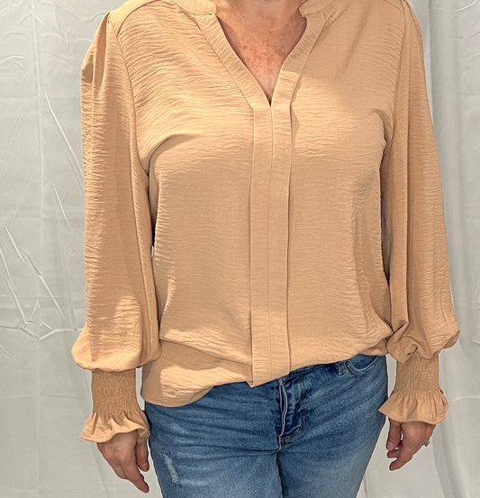 V-neck blouse with shirred cuff